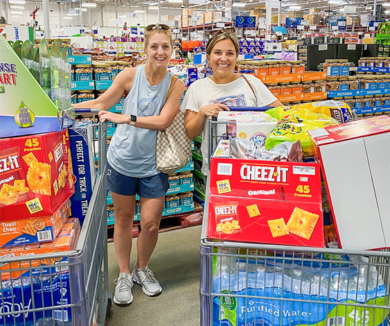 Photo of Andrea Carpenter and Callie Perkins shopping for goodie bags to donate too Nurses. 