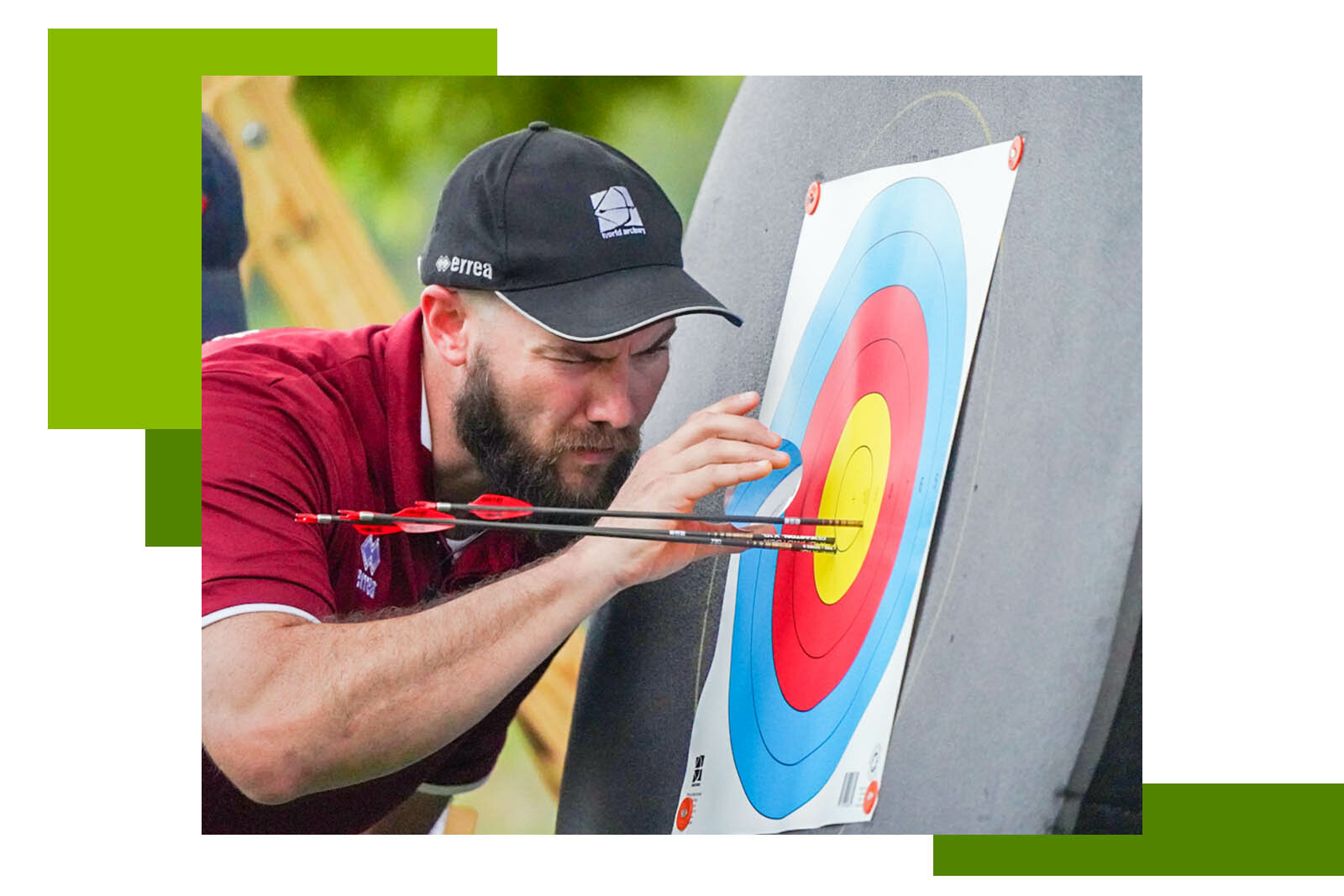 man takes a close look at arrows in a archery...