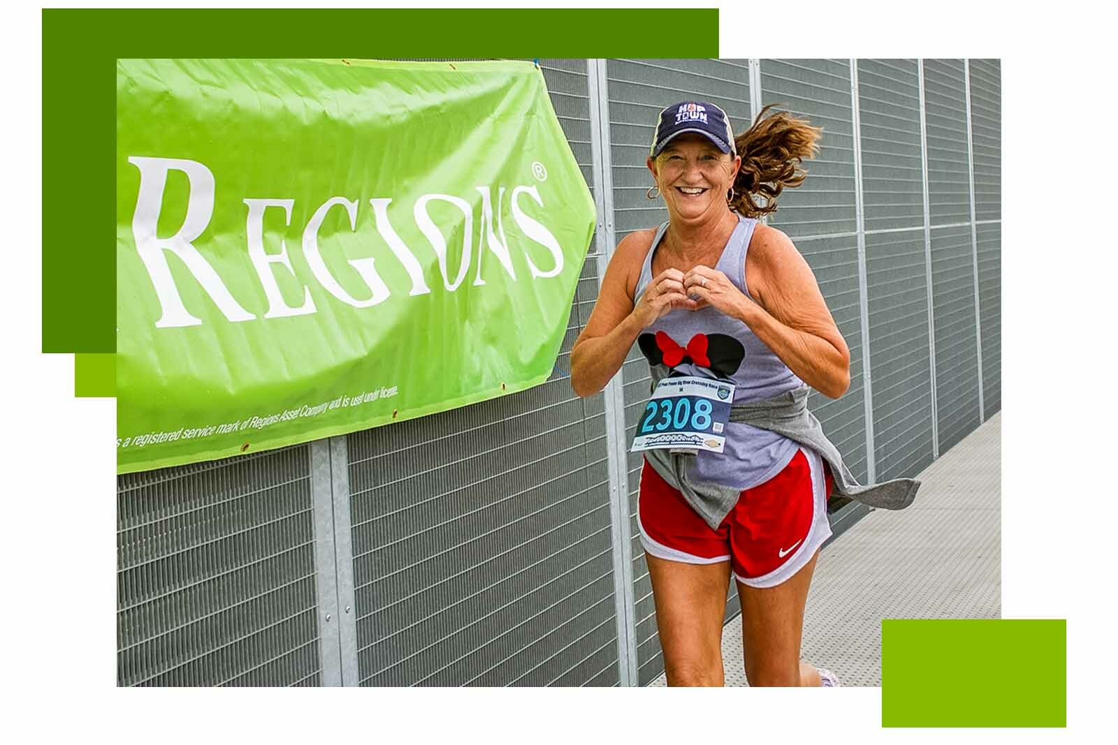 woman running next to a banner that says "Regions"