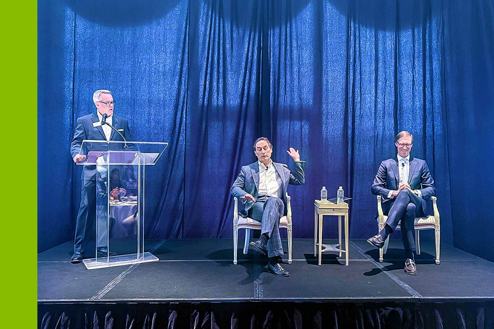 Houston Economic Summit - three leaders discussing markets updates