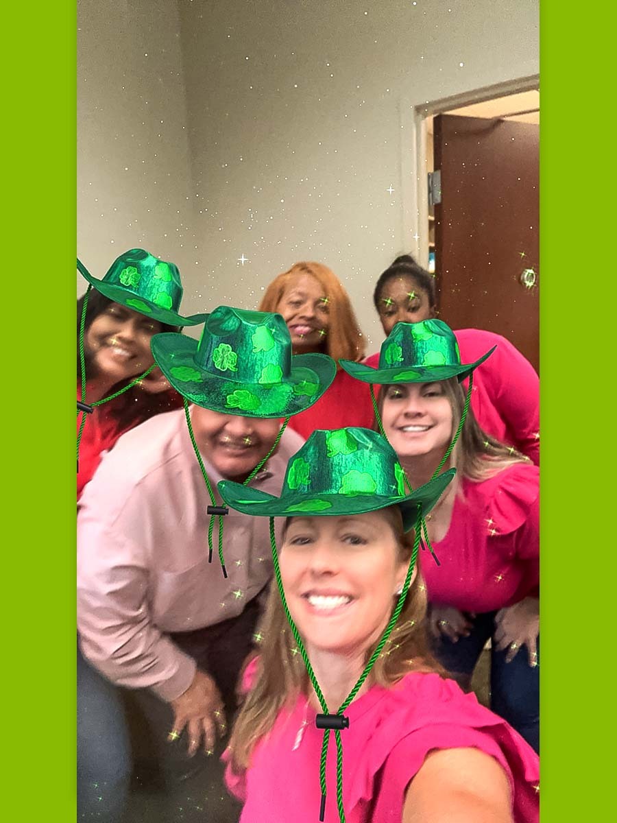 West Palm Beach associates. Group photo with green cowboy hat filter.
