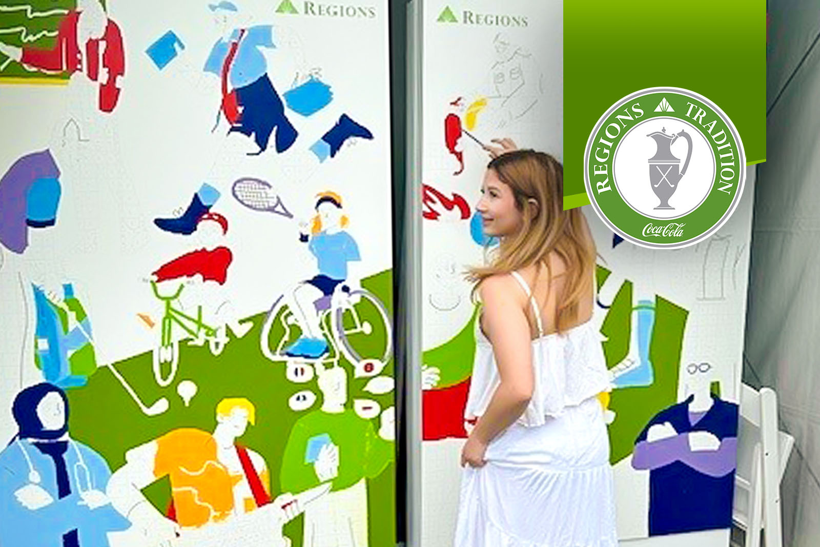 Regions Tradition attendee painting on mural.