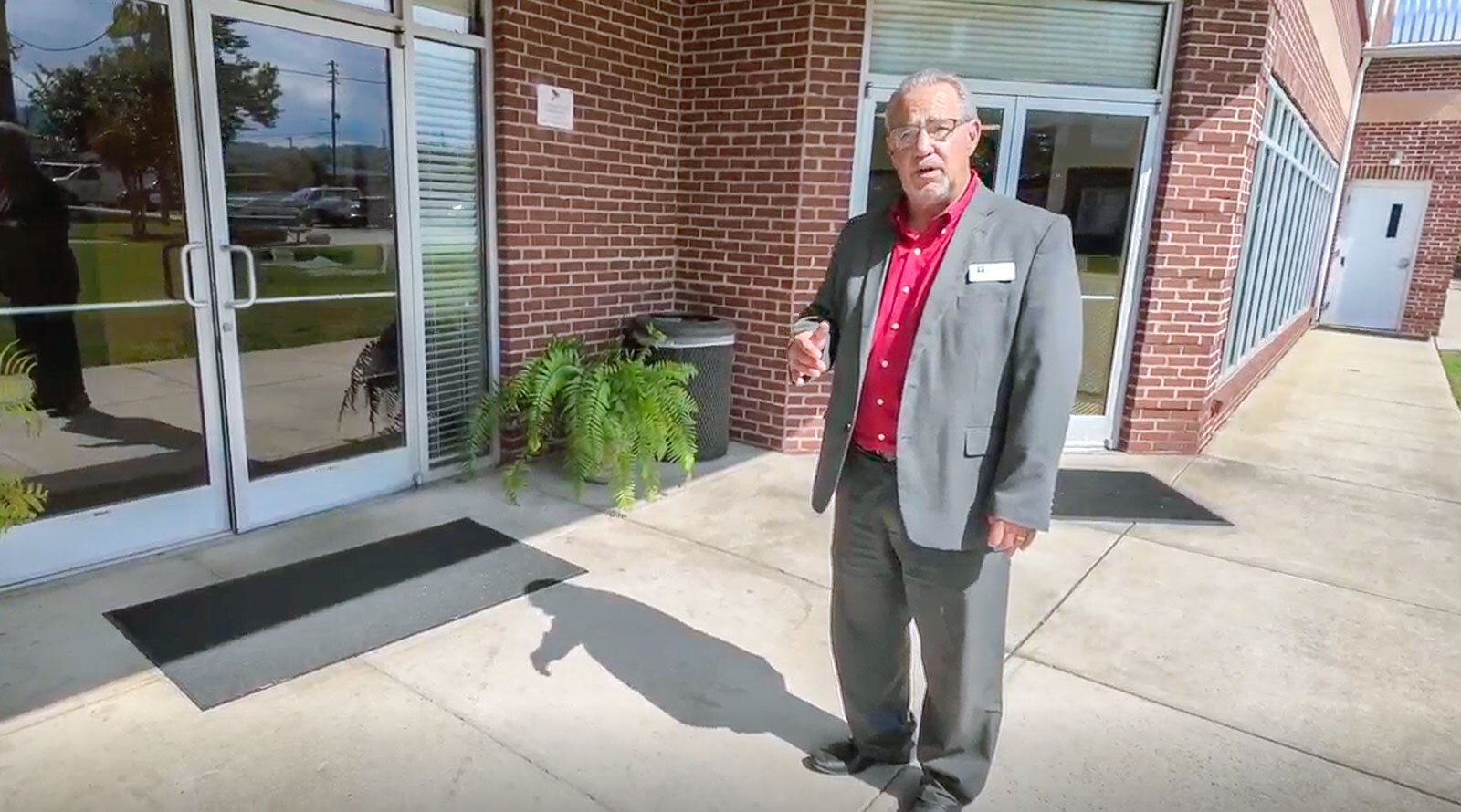 James Poe outside of the Jimmie Hale Mission building, a nonprofit in Birmingham that seeks to transform the lives of adults affected by homelessness, addiction and unhealthy living.