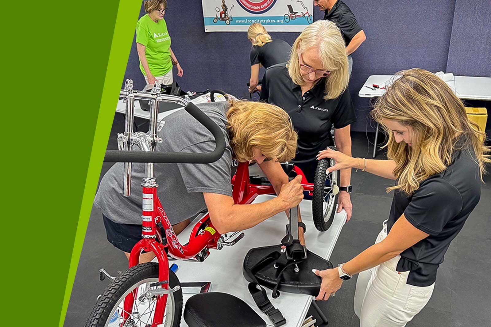 Regions Bank volunteers assembling trikes at Iron City Trykes in...