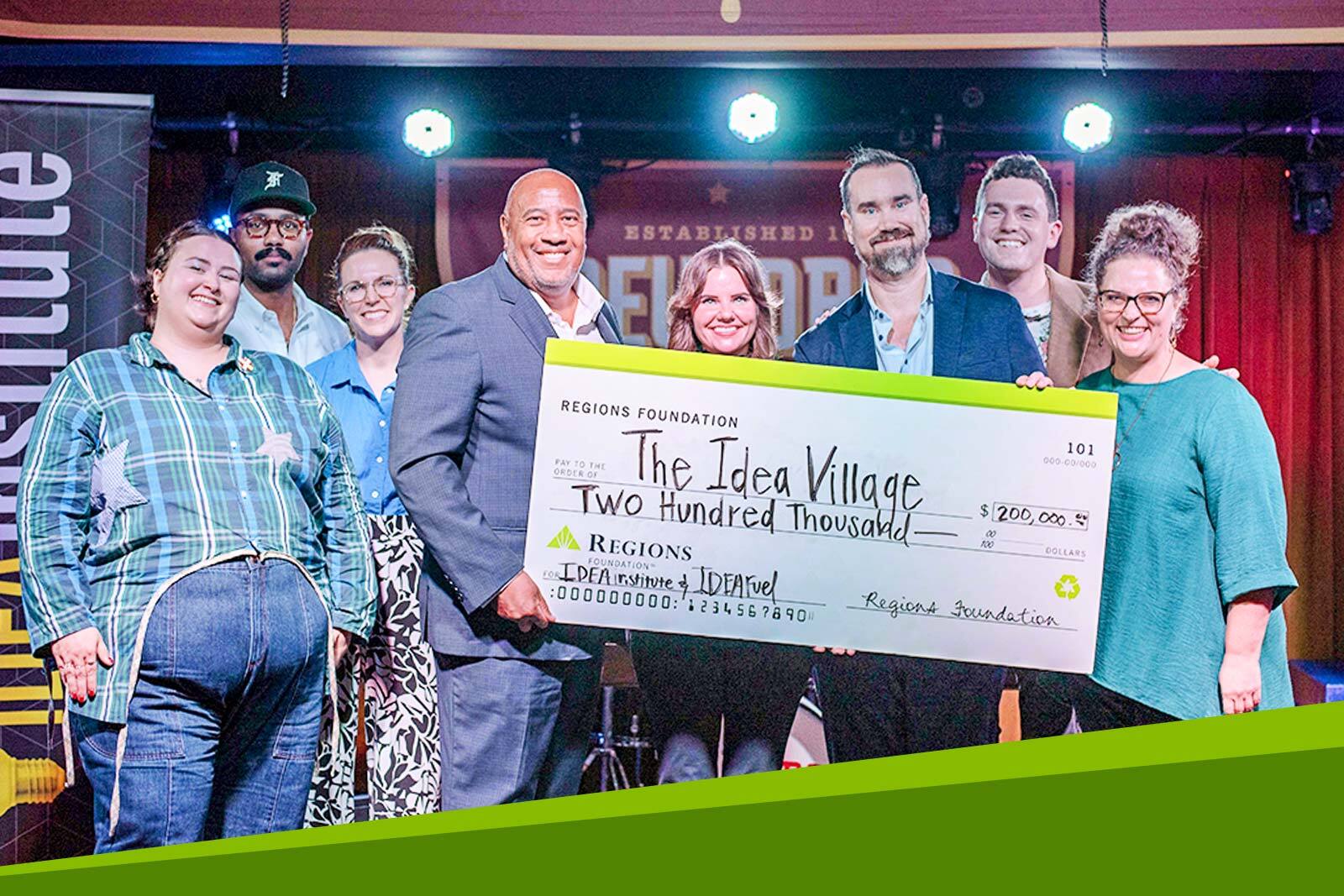 The Idea Village check presentation.