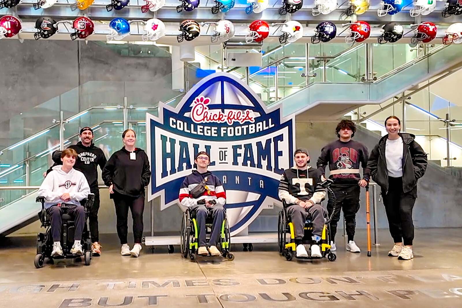 Group of injured teen athletes in front of the College...