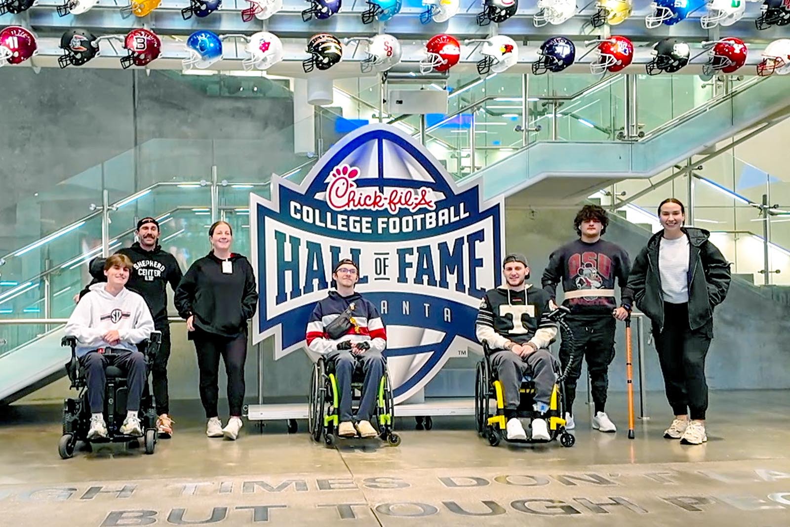 Group of injured teen athletes in front of the College...