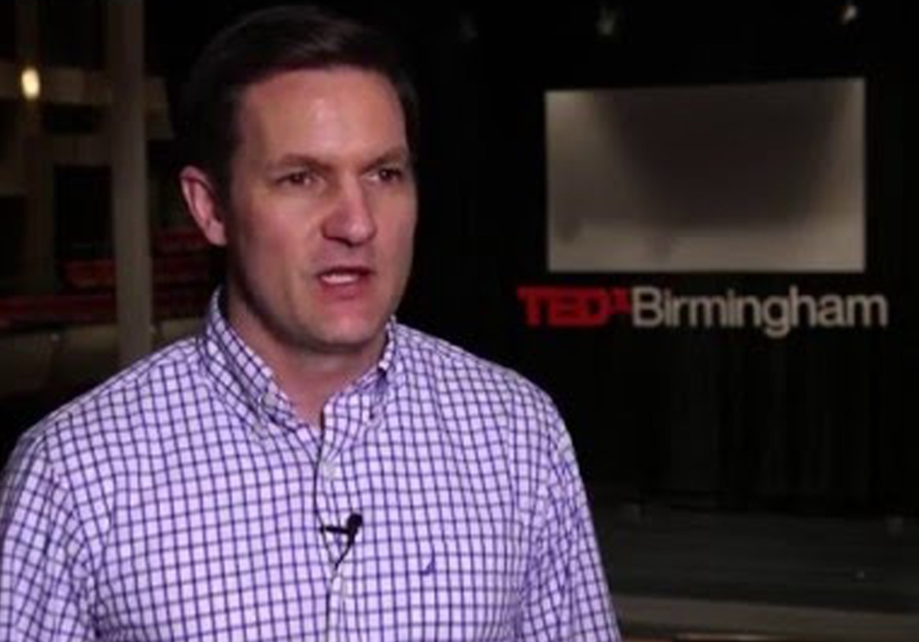 man speaking at Tedx Birmingham