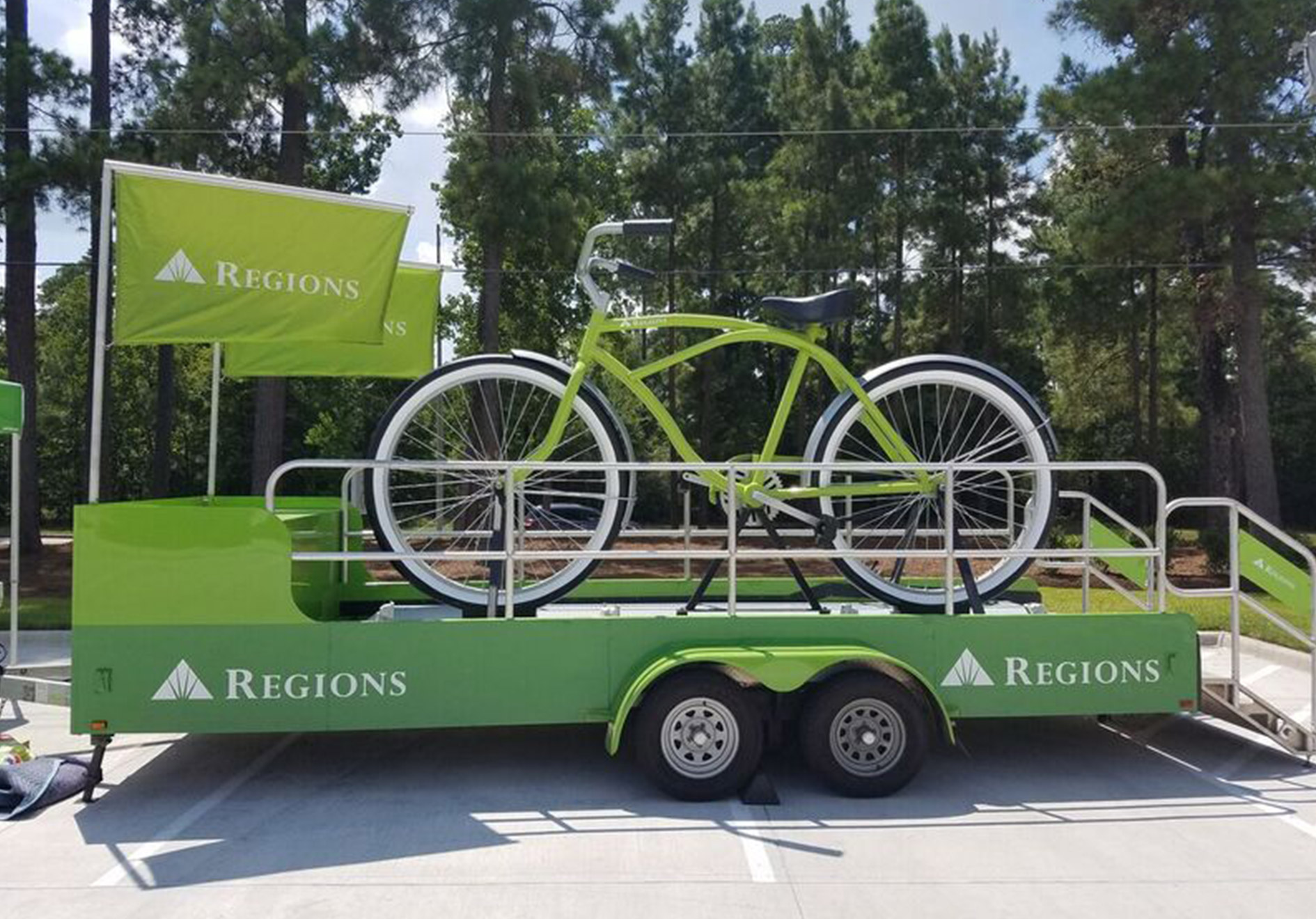 green bike standing up on trailer