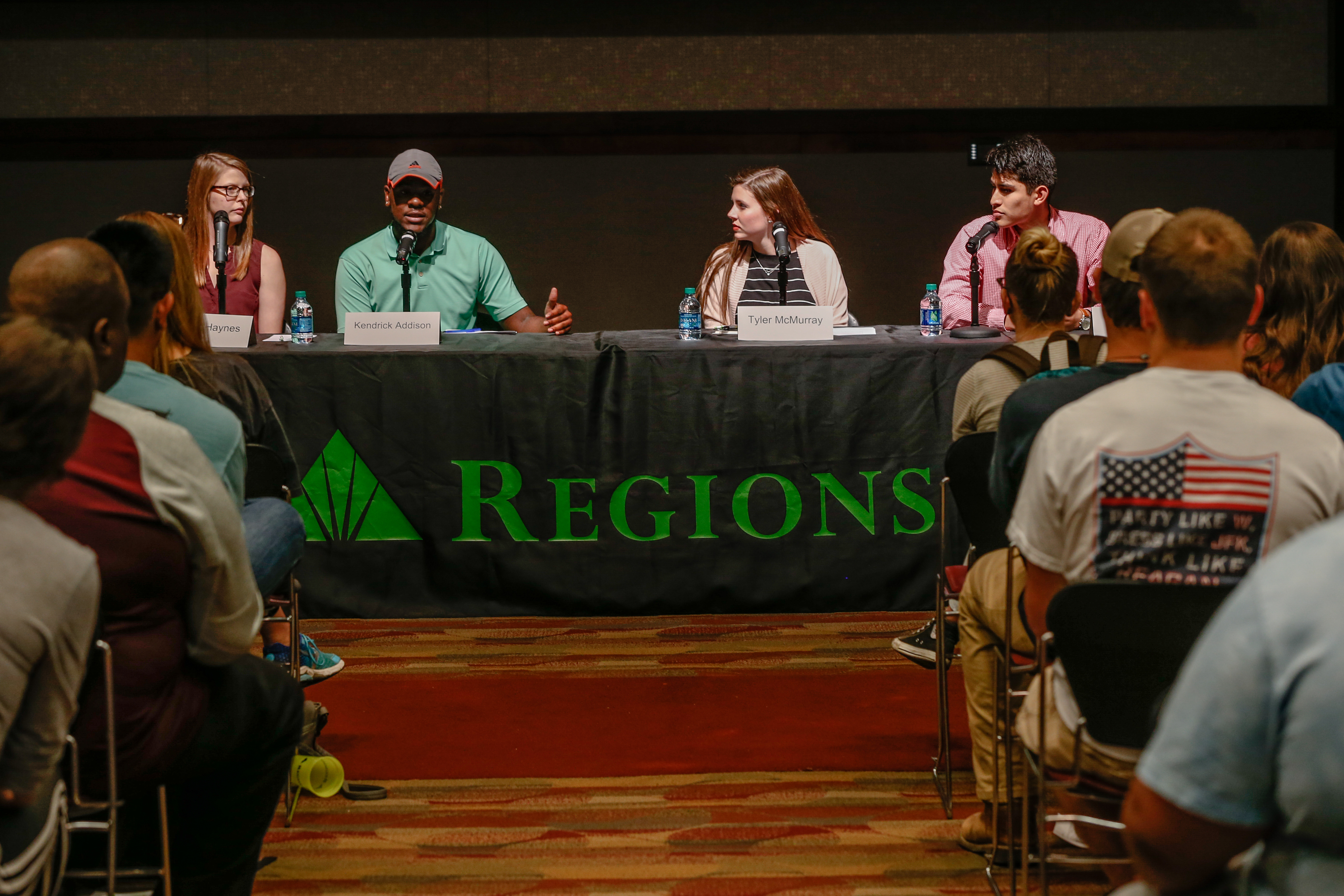 people speaking at conference at Mississippi State University