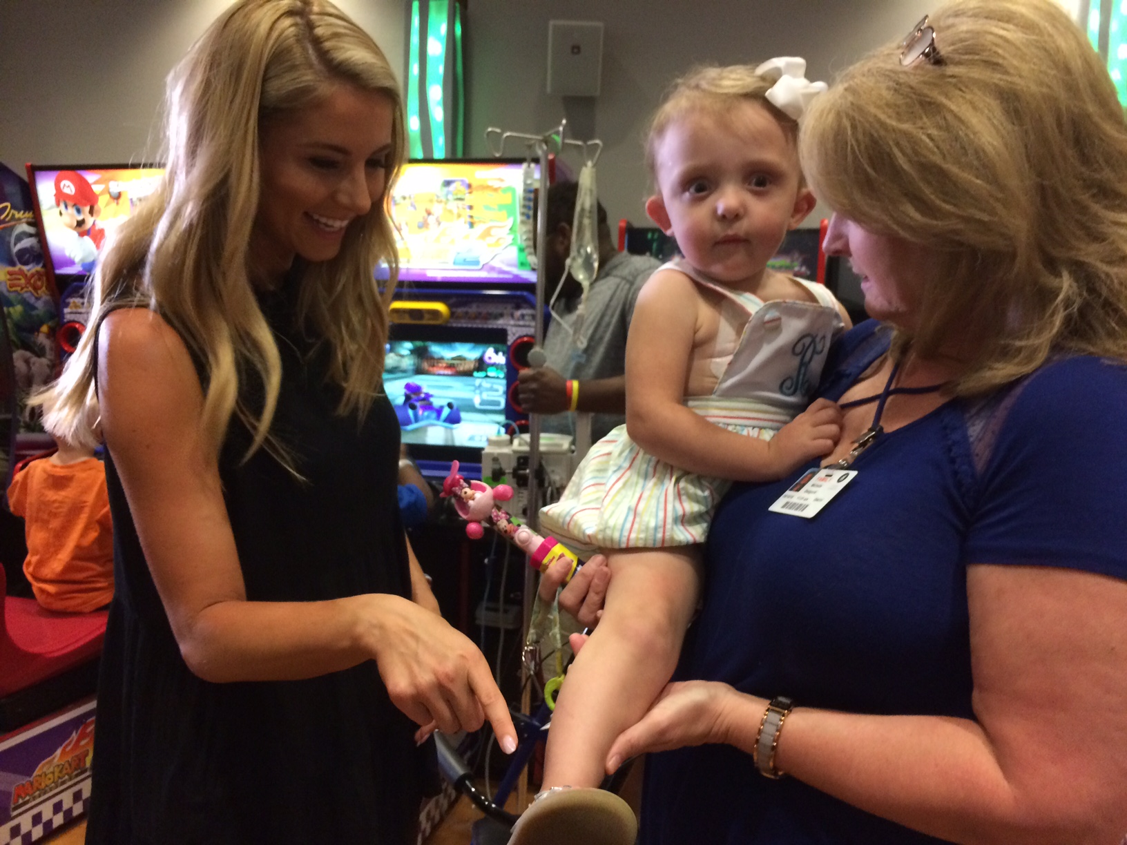 Laura Rutledge visits with a family at Children's of Alabama