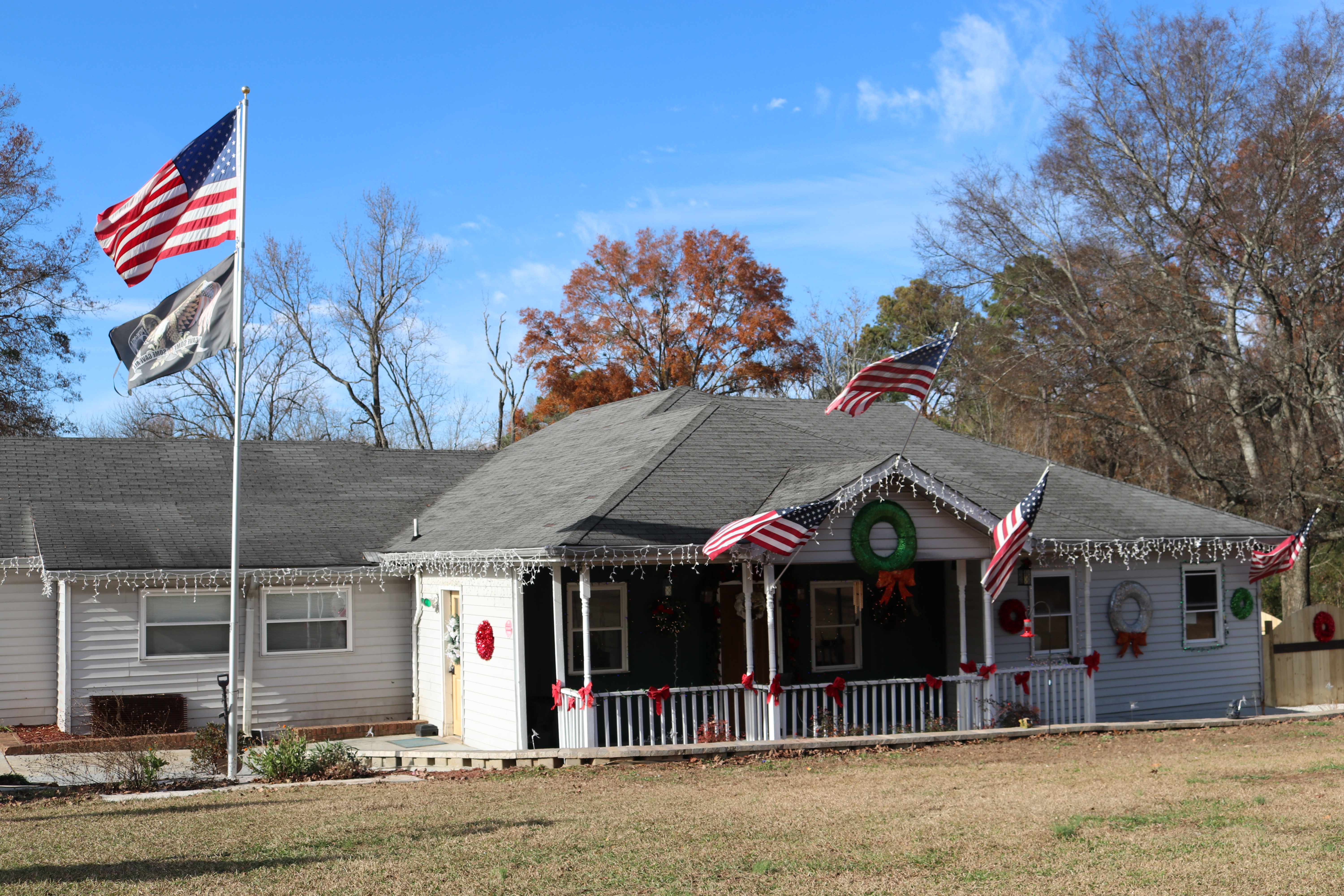 building with American flags and Christmas decor